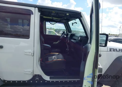 2011 Jeep Wrangler Unlimited Rubicon z USA, uszkodzony, nr VIN 1J4BA6H10BL536027